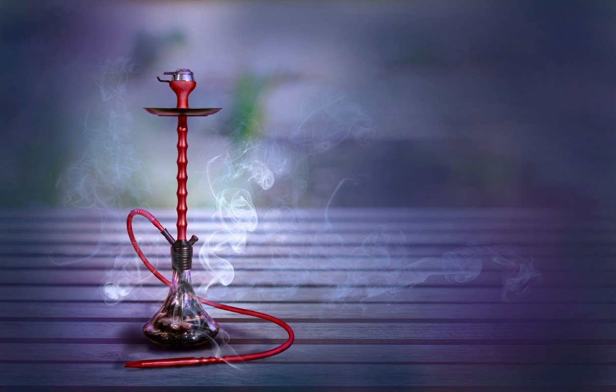 Perfect hookah smoke clouds demonstrating expert preparation